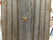 Load image into Gallery viewer, Gold Bow Necklace